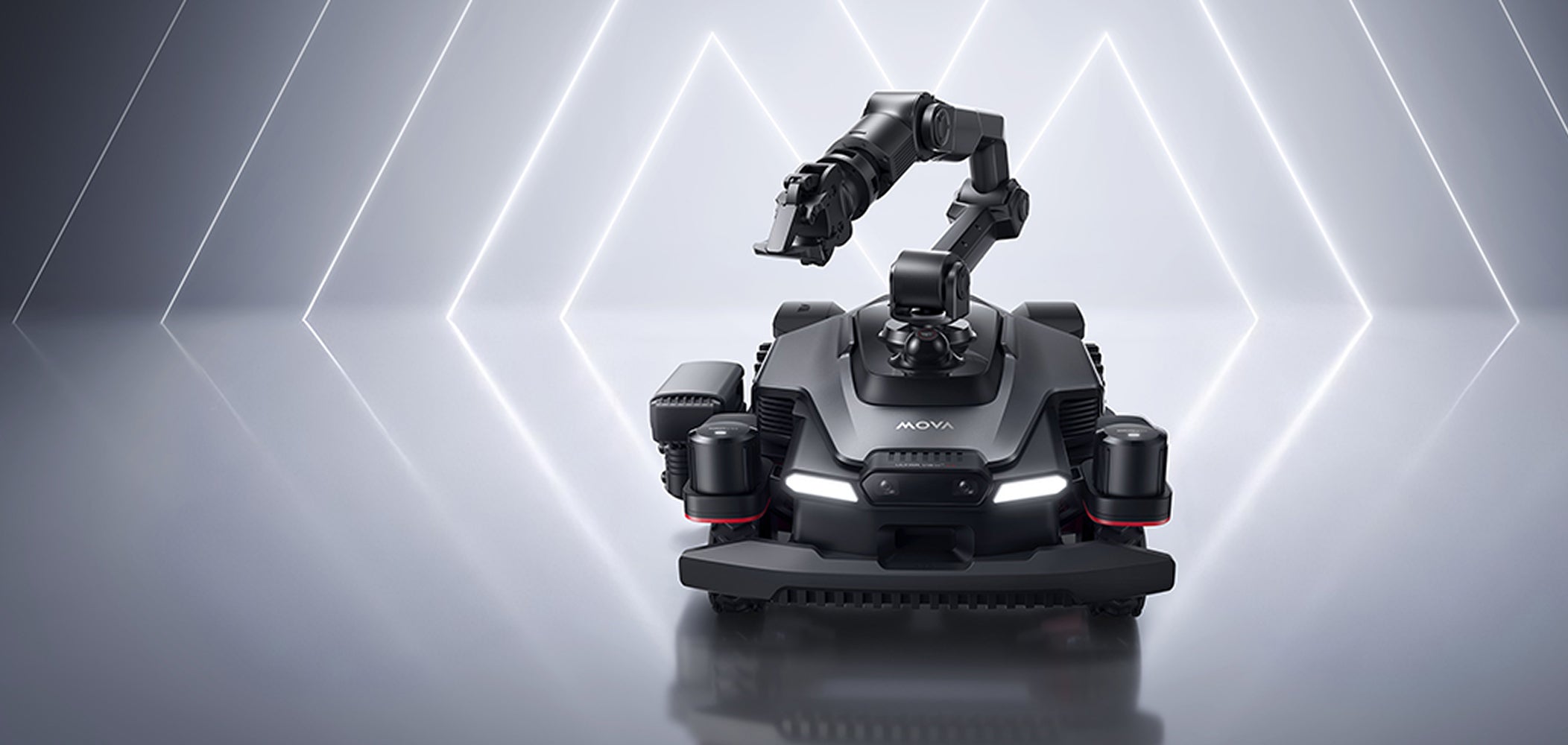 Weltweit erste Vorführung eines Mähroboters mit Roboterarm